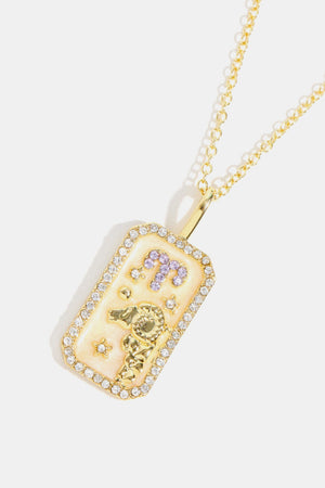 Gold-plated Aries zodiac sign crystal pendant necklace with purple accents and a gold ram charm.