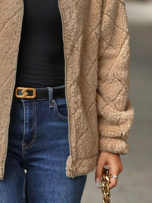 Tan textured teddy zip-up jacket with diamond quilting detail.