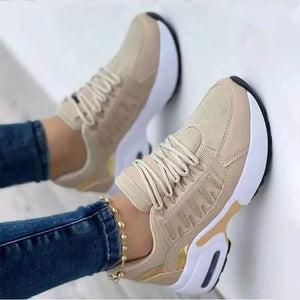 Khaki lace-up chunky platform sneakers with mesh and gold accents.