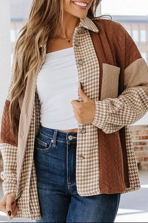 Panelled houndstooth quilted shacket in brown and tan with collared neckline and button front.