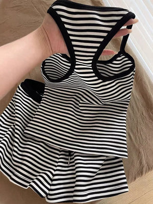 Black and white striped loungewear set with racerback tank and drawstring shorts.
