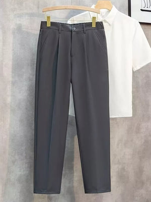 Dark gray straight-leg cargo pants with button closure and elastic waistband.