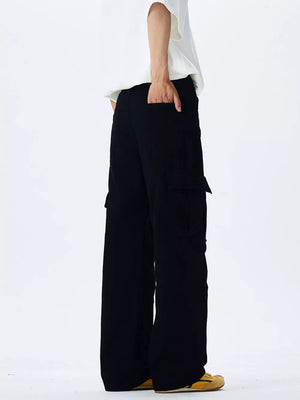 Black 100% cotton wide-leg cargo pants with side pockets and belt loops.