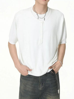 White henley t-shirt with button placket and short sleeves.