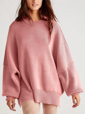 Oversized ribbed knit sweater in Dusty Pink with drop shoulders and a crew neckline.