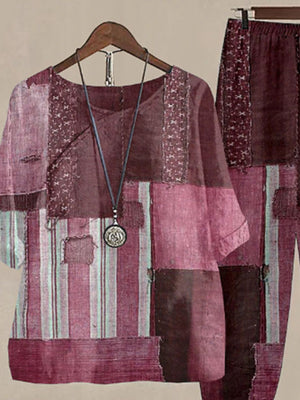 Patchwork floral print half sleeve top and pants set in plum purple and multicolor.