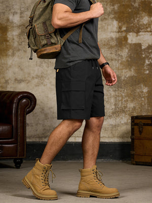 Black cargo shorts with drawstring waist and large side pockets.