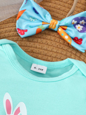 Lake blue cotton bodysuit with Easter carrot and egg print bow headband.
