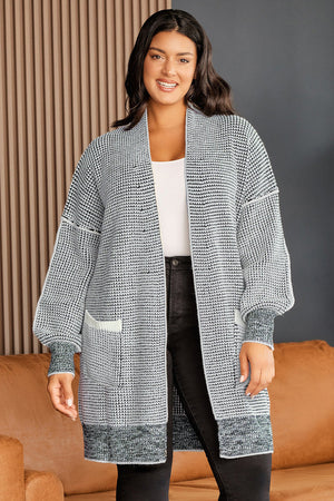 Textured knit cocoon cardigan in Cloudy Blue with pockets and balloon sleeves.