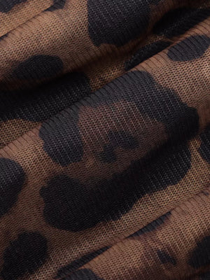 Sheer leopard print t-shirt with intricate lace detail on sleeves.