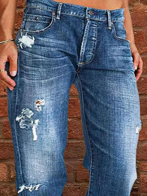 Relaxed fit blue denim maternity jeans with distressed details and raw hem