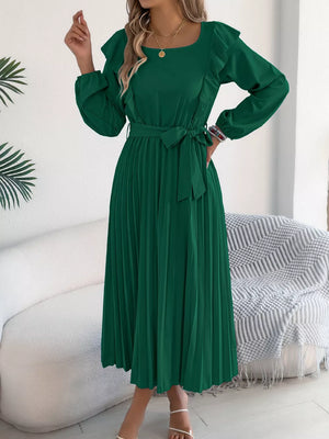 Green ruffled A-line midi dress with long sleeves, square neck, and pleated skirt.