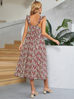 Leopard print midi dress in deep red with ruffle straps and a cinched waist.