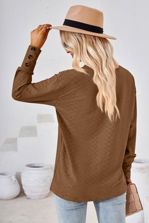 Brown textured long sleeve blouse with button cuff detail