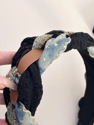 Black braided headband with denim starburst and leatherette accents