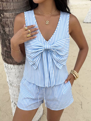 Blue and white striped two-piece set with a large bow detail on the top and drawstring shorts.
