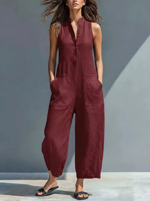 Wine red button-down sleeveless romper with pockets and a collared neckline.