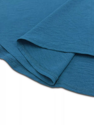 French Blue button-down maxi dress detail showing textured fabric and double-stitched hem.
