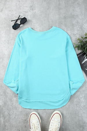 Aqua sweatshirt with asymmetric hemline and raw edge detail