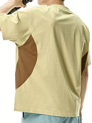 Men's oversized t-shirt in chartreuse with brown geometric panel details and crew neck.
