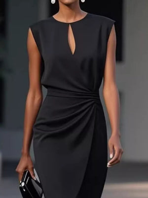 Black ruched dress with keyhole neckline and sleeveless design.