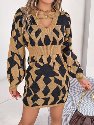 Geometric cutout knit mini dress in khaki and black with a v-neck and long sleeves.