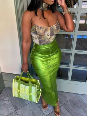 Glistening lime green high-waisted maxi skirt with ruched detail and a thigh-high slit.