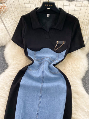 Buttoned denim patchwork bodycon dress with collared neckline and chain detail.