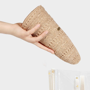 Beige knitted bucket hat with openwork pattern and a small logo detail