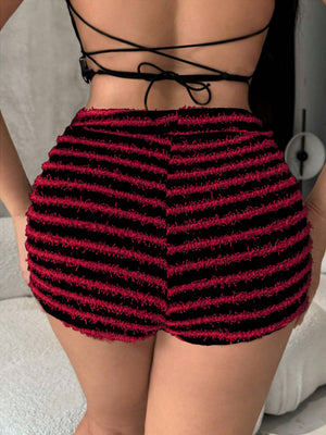 Textured stripe bouclé shorts in black and red with a fuzzy finish.