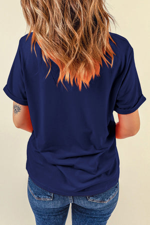 Dark blue crewneck tee with cuffed short sleeves and a watercolor bow print.