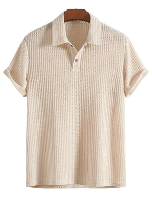 Beige textured polo shirt with rolled sleeves and button neckline