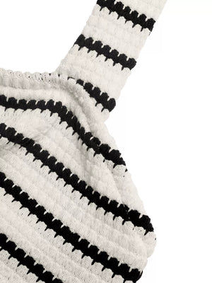 Chic Cutout Knit Mini Dress in white with black stripes, textured knit fabric and cutout detail.