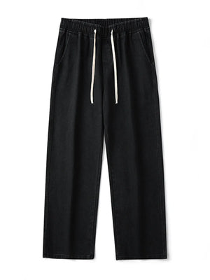 Black relaxed wide-leg jeans with drawstring waist and pockets