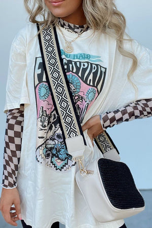 Optical Illusion Checkered Mesh Top in beige with a graphic print tee.