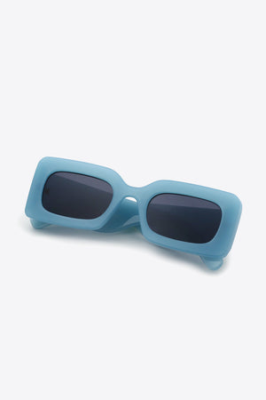 Teal acetate rectangle sunglasses with dark lenses