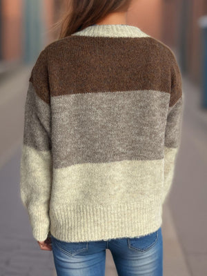 Colorblock crewneck button-down knit sweater in beige, gray, and brown acrylic.