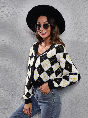 Argyle cropped cardigan in ivory, black, and yellow with button front and V-neck.