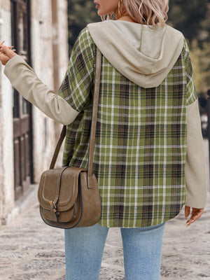 Colorblock plaid hooded shirt jacket in matcha green with contrast sleeves and tan hood.