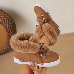 Brown fluffy cuff round-toe platform boots with white soles and lace-up closure.