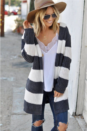 Chunky knit hooded cardigan with wide stripes in cream and charcoal gray.