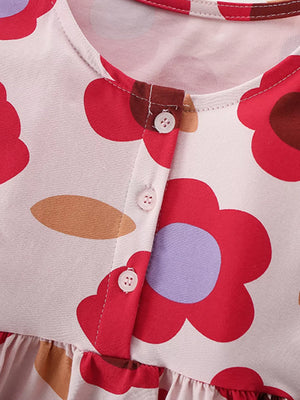 Toddler cotton dress with playful red floral print and button-down front.