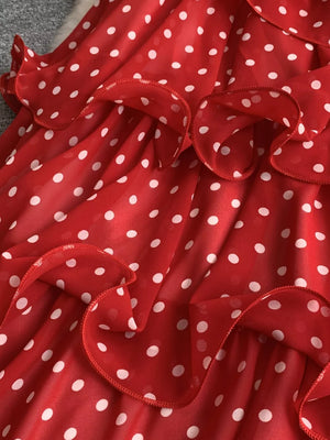 Red polka dot tiered dress with ruffled trim detail