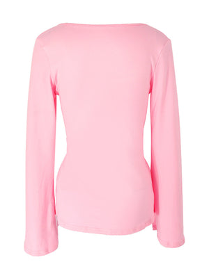 Pink long sleeve t-shirt with a wide neckline and tie front detail.