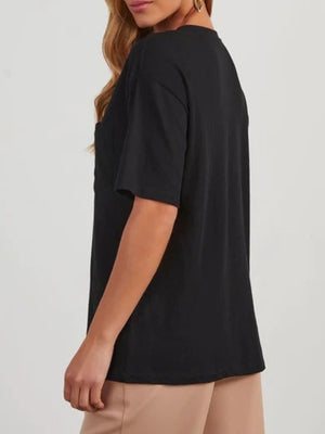 Black linen boxy tee with patch pocket and short sleeves.