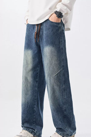 Men's blue vintage wash wide-leg denim jeans with drawstring waist