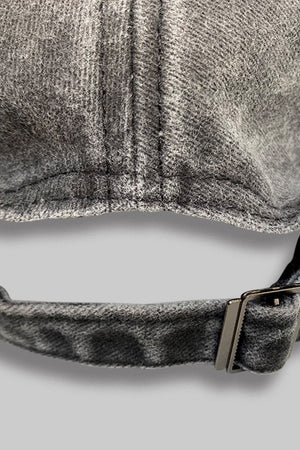 Dark gray baseball cap with adjustable strap and metal buckle detail