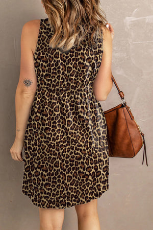 Sleeveless leopard print midi dress with elastic waist and a-line skirt.