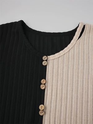 Split-panel ribbed henley top in black and beige with wooden buttons.