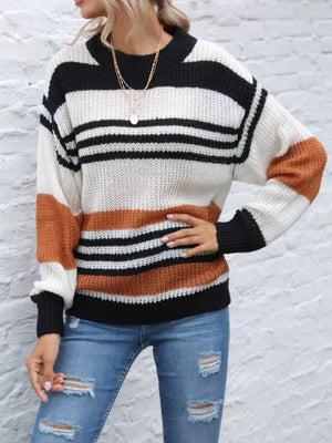 Casual striped knit sweater with color block accents in beige, black, and white acrylic.